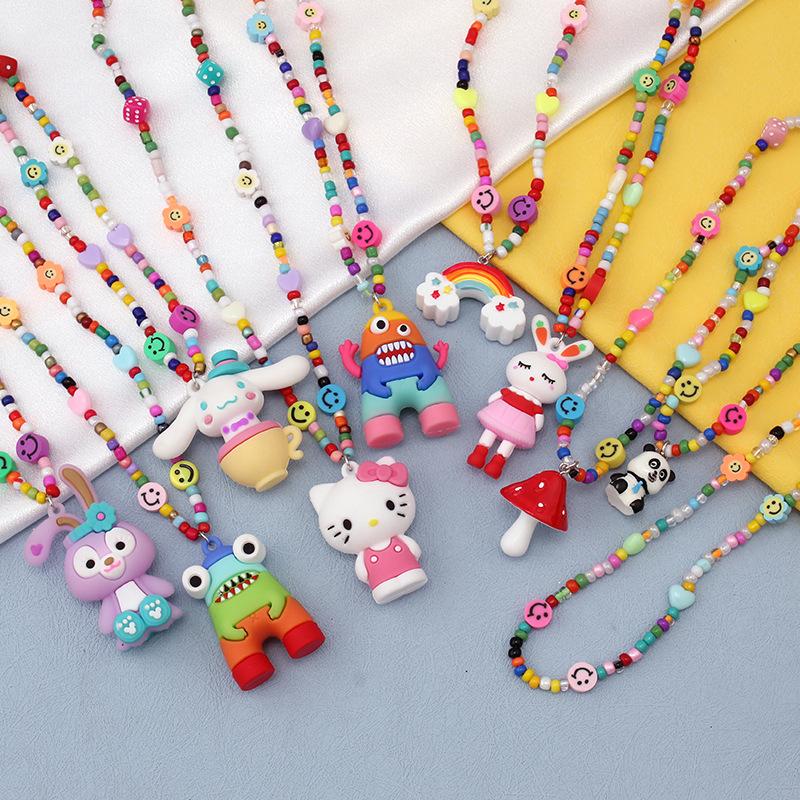 Ins niche design cartoon rainbow monster pendant rice bead necklace hip-hop all-match sweater chain trend style