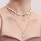 Jewelry ins multi-layer devil's eye beaded necklace female niche design imitation pearl clavicle chain