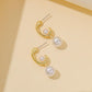 Ins niche design French temperament pearl earrings creative simple C word OL fashion all-match metal earrings