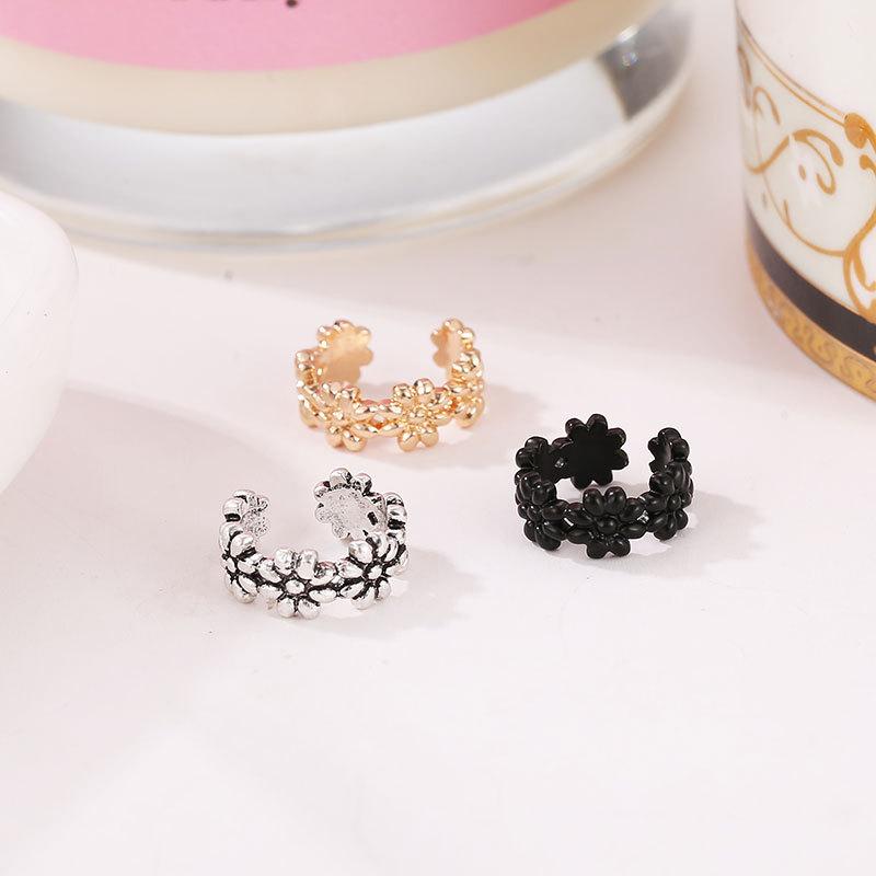 Simple small fresh U-shaped small daisy flower curved ear clip women's metal earrings without earrings