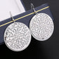 Palace exaggerated retro hollow flower earrings disc swing frosted star earrings of the same style