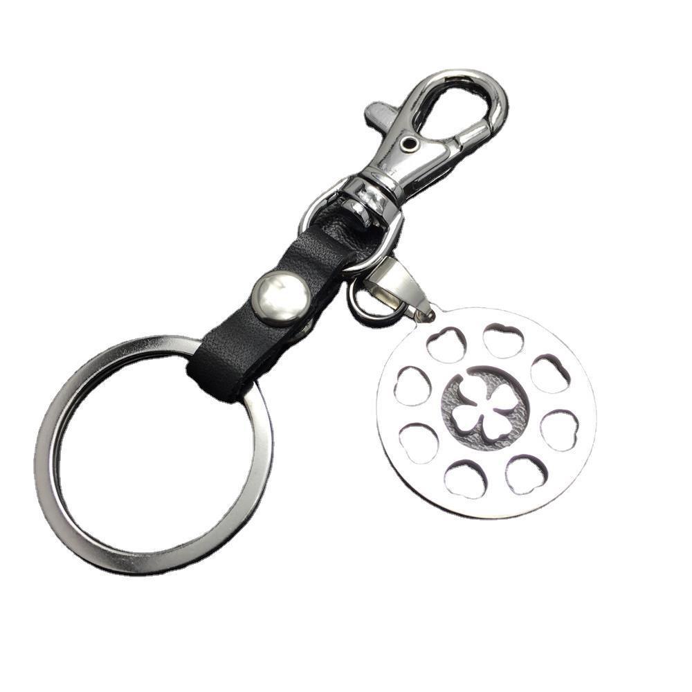 Four-leaf lucky flower titanium steel jewelry stainless steel luggage pendant leather key chain waist hanging couple gift bag listing