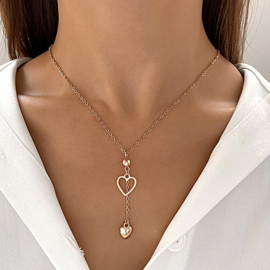 Ins hollow love necklace female fashion temperament niche design diamond heart-shaped clavicle chain net red pendant