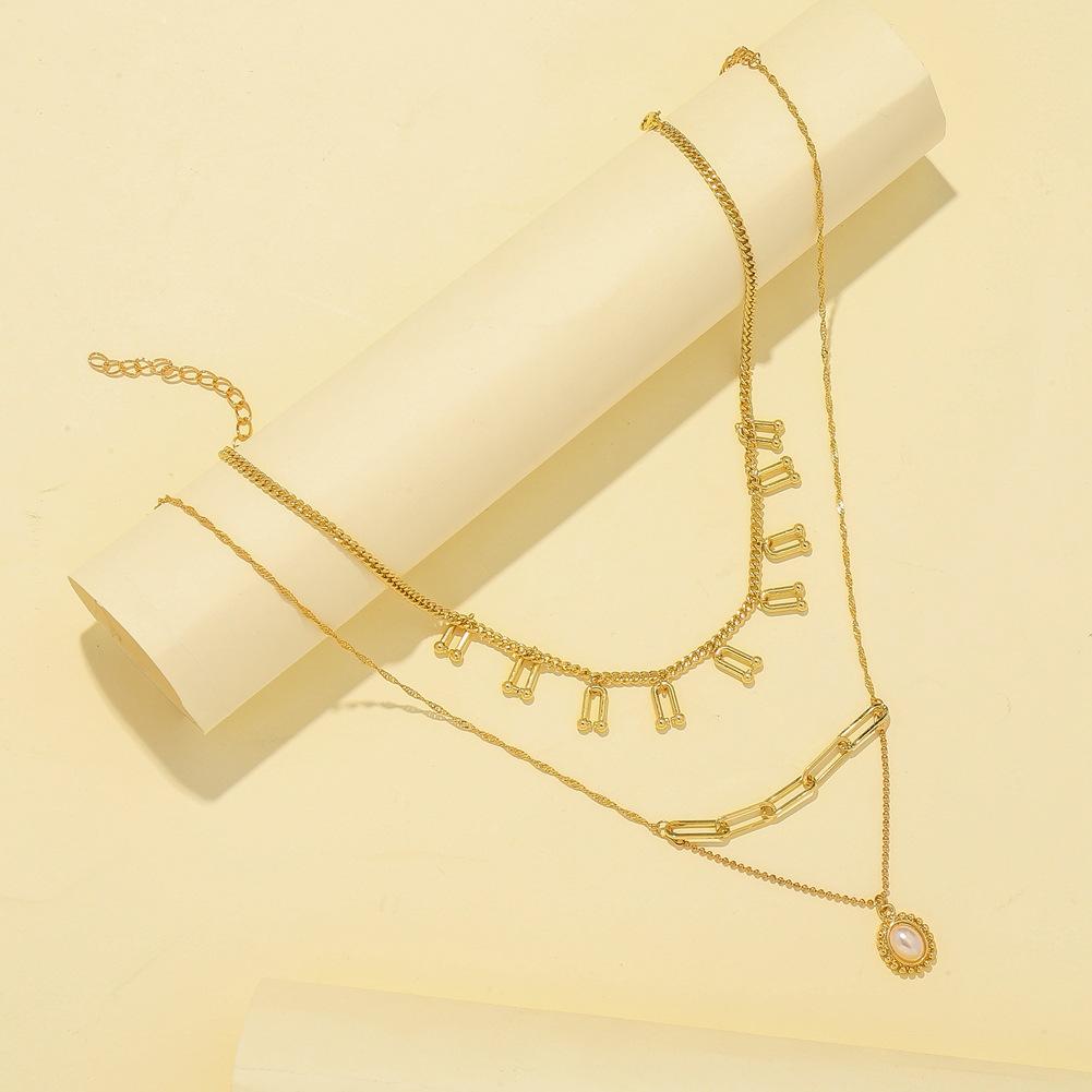 Fashion multi-layer U-shaped horseshoe tassel necklace personality oval pearl pendant clavicle chain jewelry female