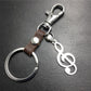 Titanium steel note cowhide key chain pendant luggage logo tag music accessories lover gift