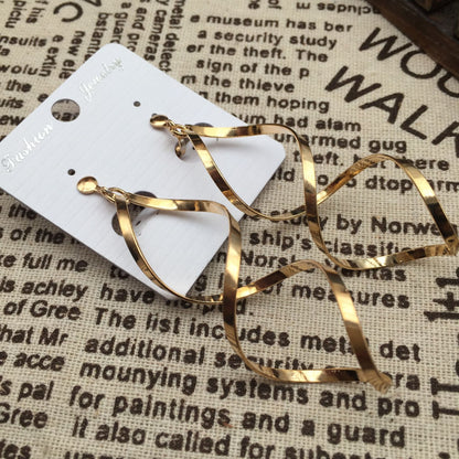 Exaggerated spiral ear clips can be worn with or without pierced ears Promotional gift giveaway