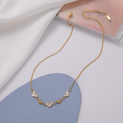 Stainless steel Ins cold fashion multiple small hearts white shell collarbone necklace female does not fade