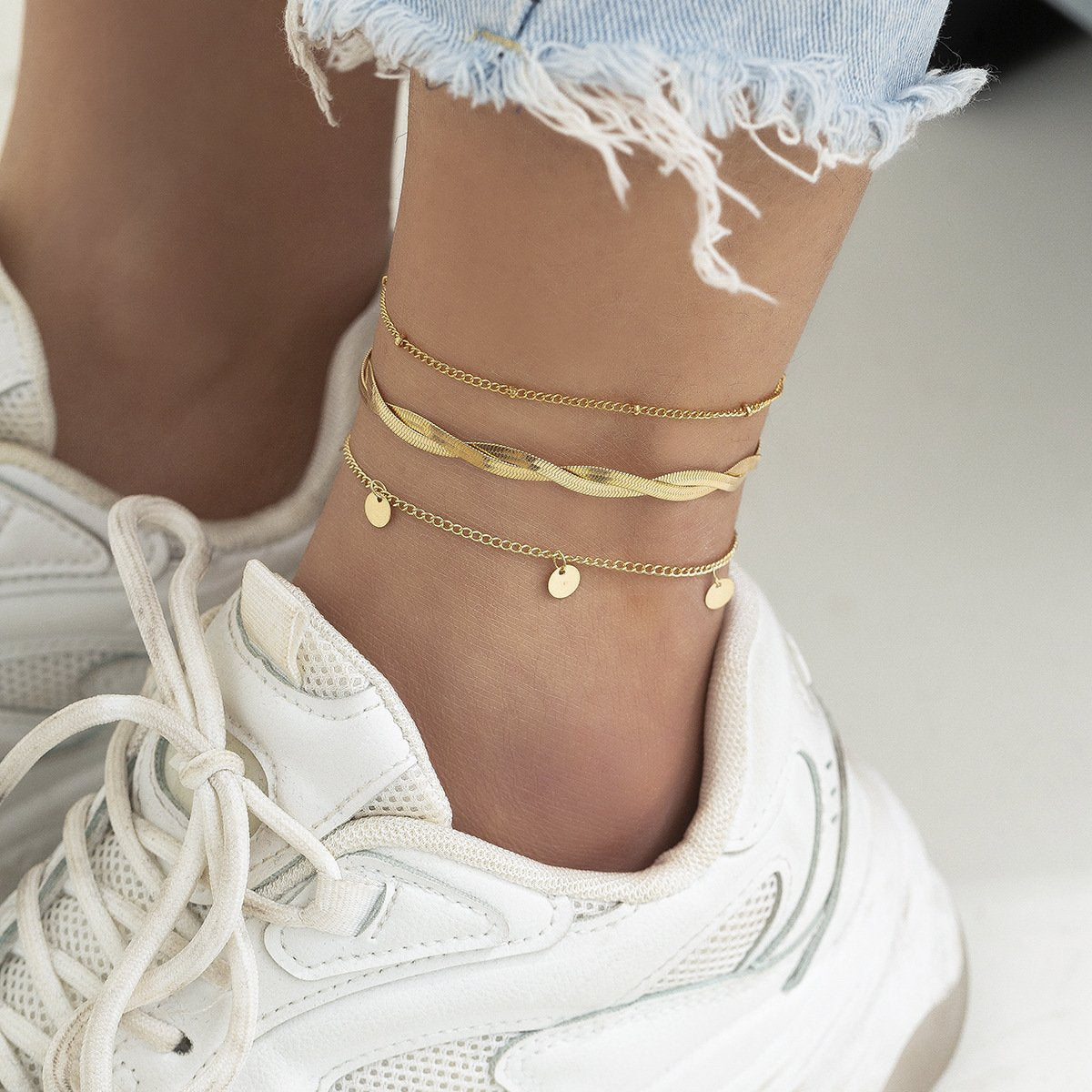 Jewelry niche simple woven snake bone chain anklet female retro metal sequin pendant foot decoration