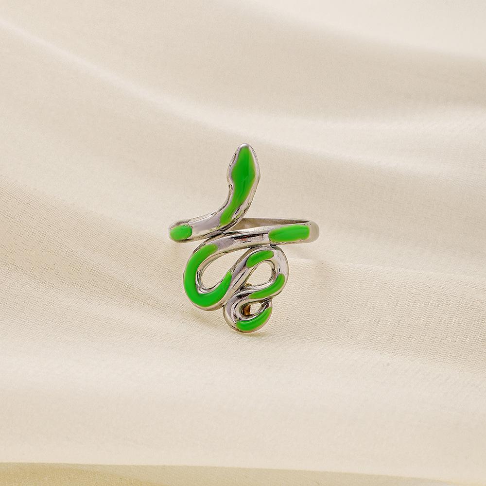 Trendy light luxury niche design green dripping oil snake-shaped stainless steel men's and women's rings