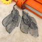 Fashion and personality explosion models hollow four leaves ladies earrings popular earrings stalls