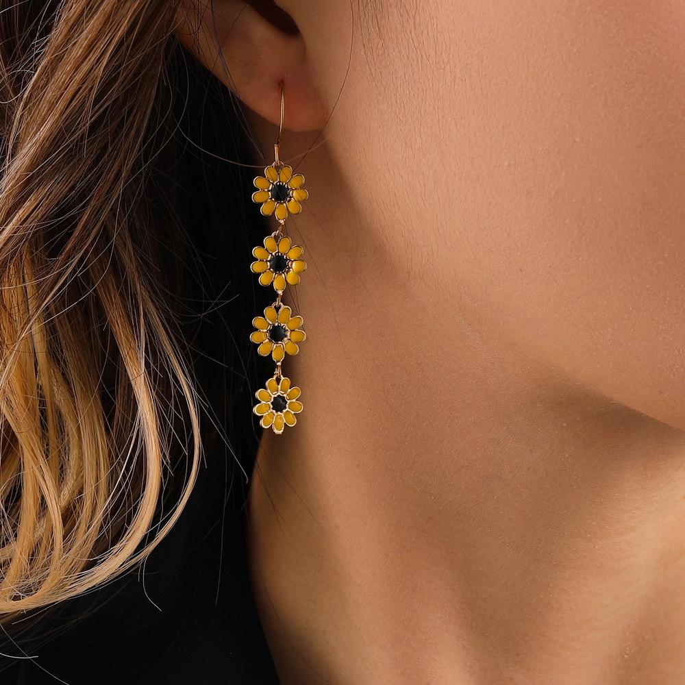 Niche small fresh personality literary retro all-match fashion ladies small daisy flower color earrings earrings