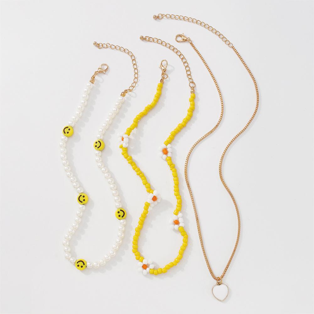 N9524 Bohemian Ethnic Necklace Rice Bead Flower Smile Face Creative Necklace Fashion Simple Necklace