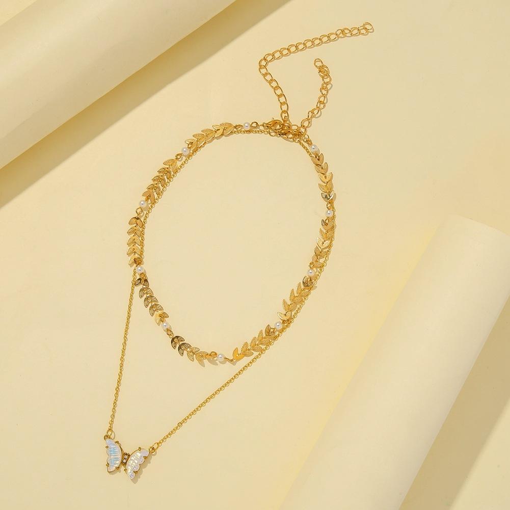 Temperament pearl wheat ear double-layer clavicle chain stainless steel gold-plated color shellfish butterfly titanium steel pendant necklace jewelry