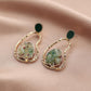 Irregular geometric fashion hollow green aventurine crushed stone earrings personality dripping oil gourd earrings