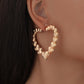 Simple trend personality metal hollow three-dimensional heart-shaped glossy earrings ins temperament retro earrings female
