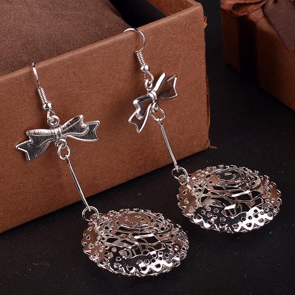 Three-dimensional Hollow Round Body Alloy Earrings Ladies Bow Knot Earrings