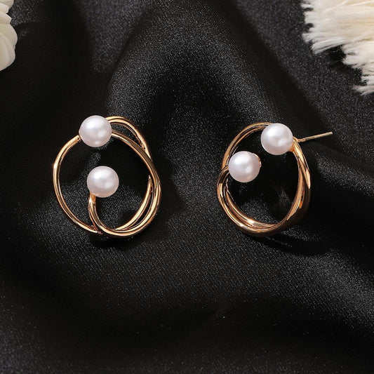 Personality simple ins net red geometric pearl earrings fashion high-end knotted round stud earrings