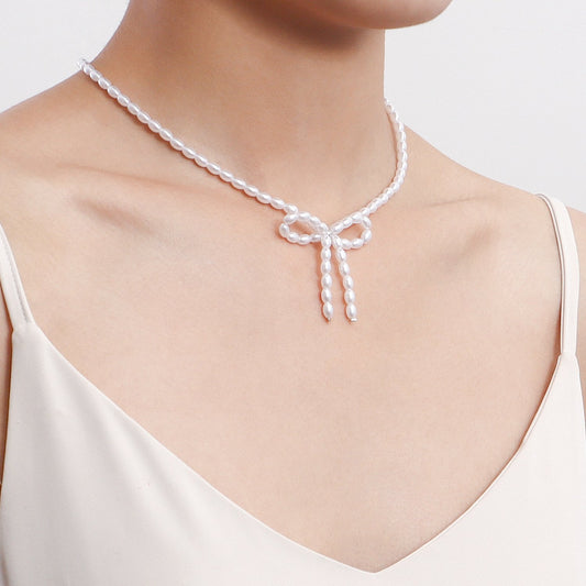 Jewelry choker bow imitation pearl necklace female minority design sense light luxury beaded necklace