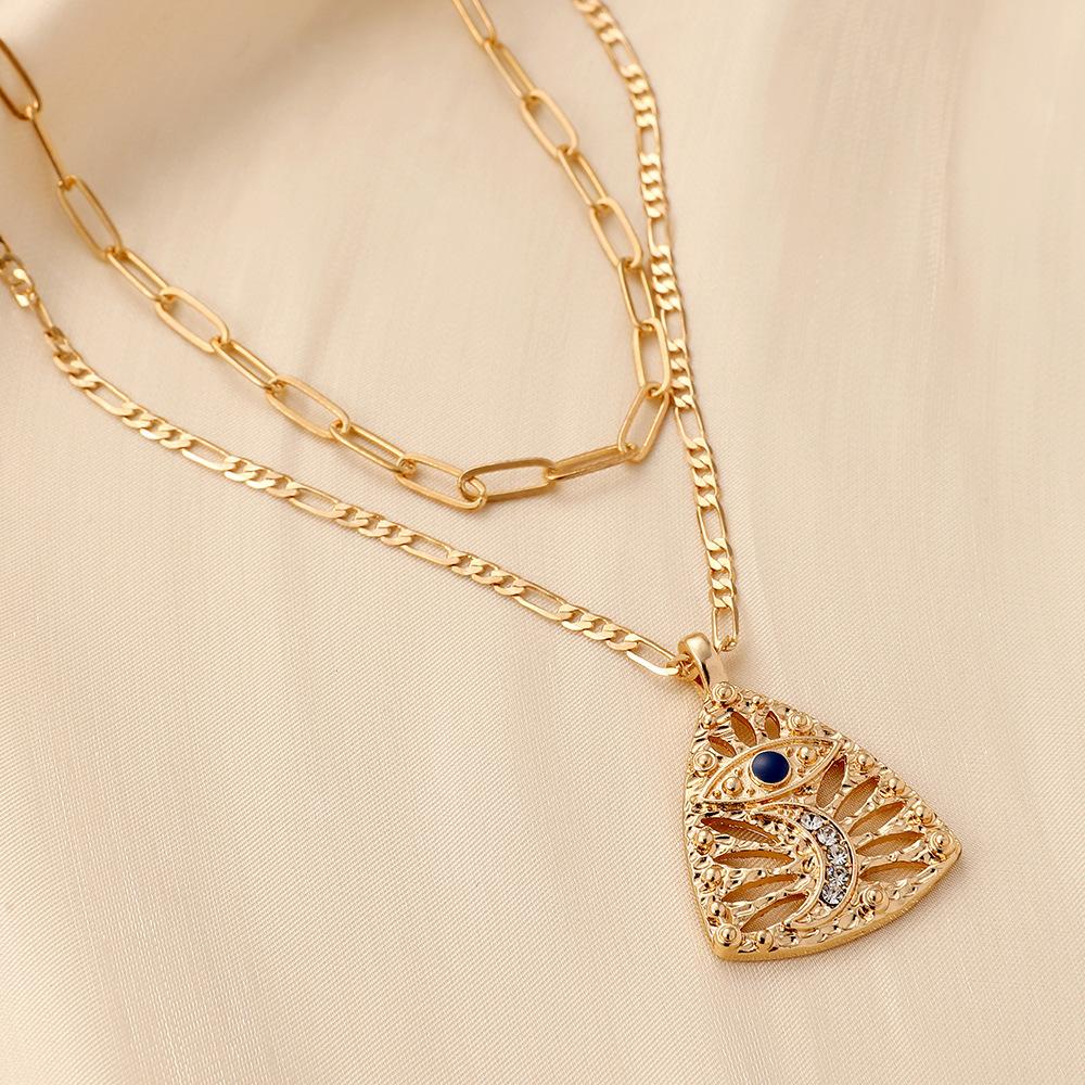 Ins personalized trend design high-end clavicle chain double-layer triangular hollow eyes moon dripping oil necklace female