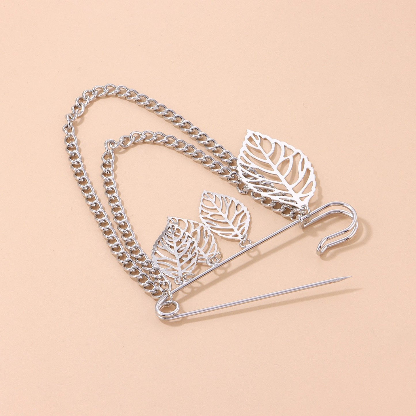 Jewelry Temperament Light Luxury Hollow Leaf Brooch Female Retro Trend Metal Chain Pin Accessories