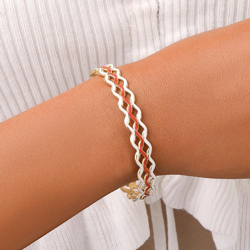 Original design niche stainless steel drop oil hollow wave adjustable bracelet women's titanium steel bracelet