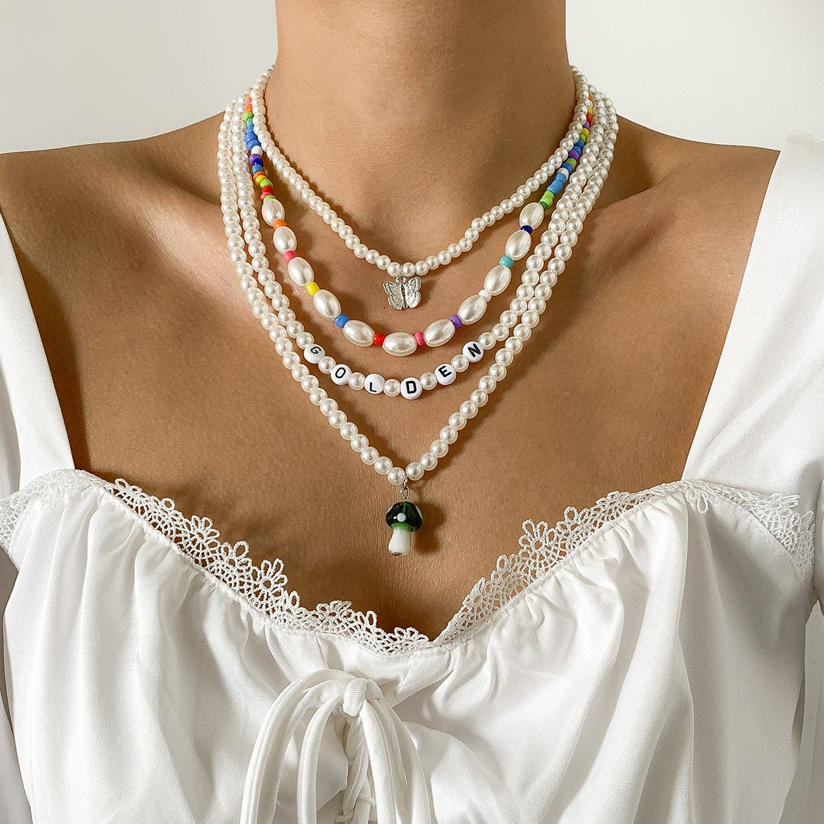 Jewelry creative mix and match multi-variety mushroom butterfly necklace set beaded imitation pearl letter necklace
