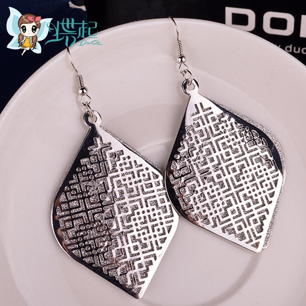 Supply boutique ear jewelry Hollow Chinese earrings multi-layer alloy frosted earrings