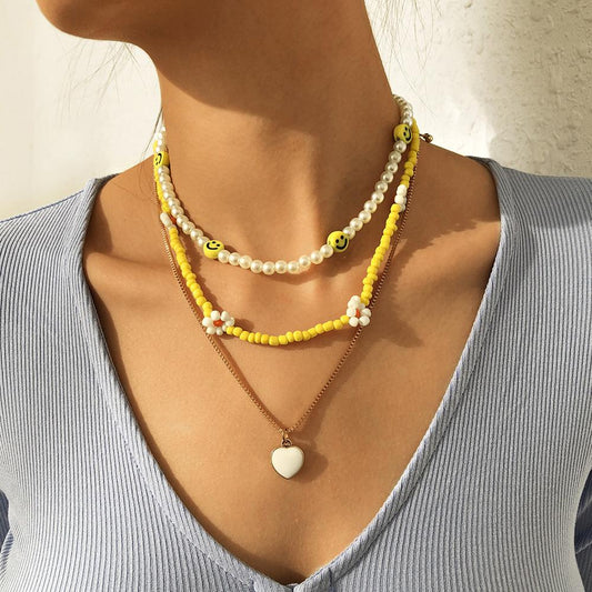 N9524 Bohemian Ethnic Necklace Rice Bead Flower Smile Face Creative Necklace Fashion Simple Necklace