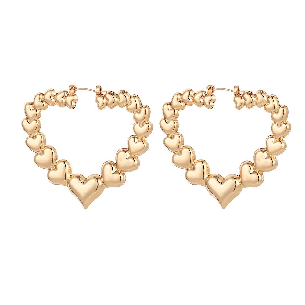 Simple trend personality metal hollow three-dimensional heart-shaped glossy earrings ins temperament retro earrings female