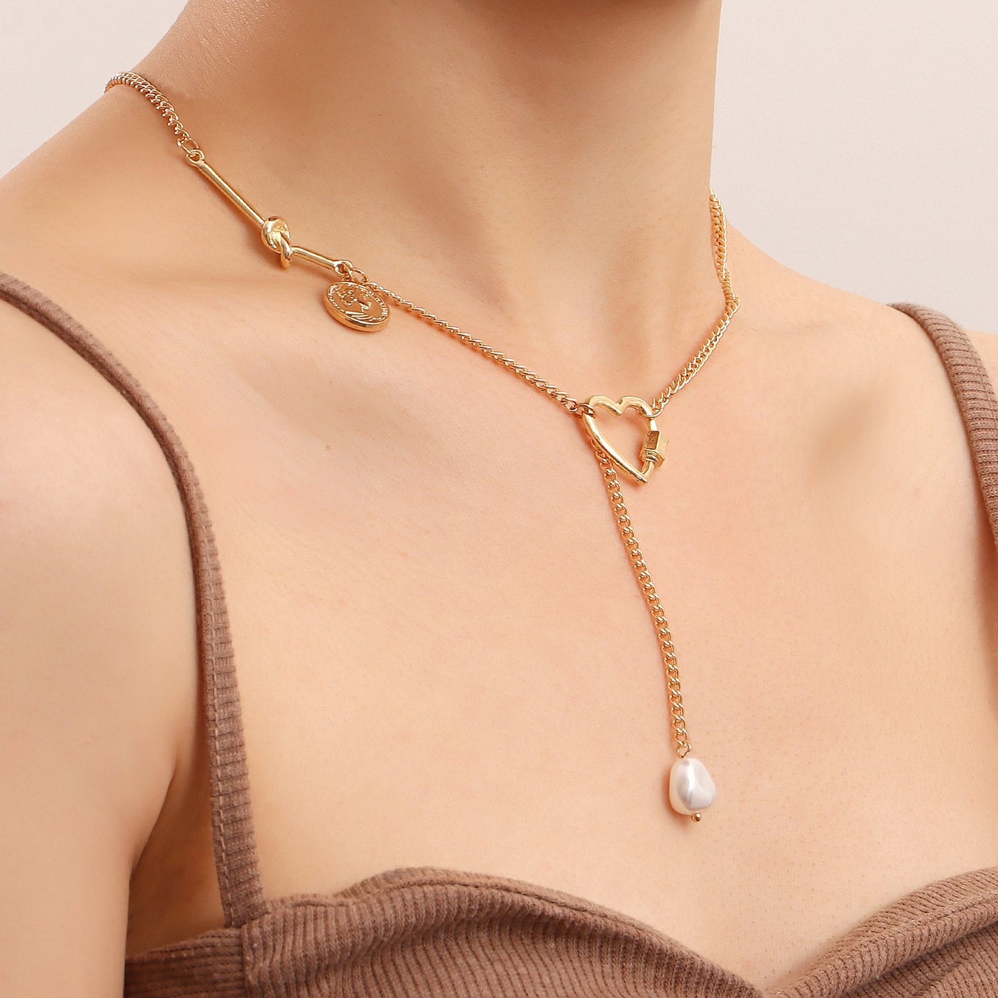 Explosive simple long tassel hollow love pendant necklace female ins niche design sense light luxury