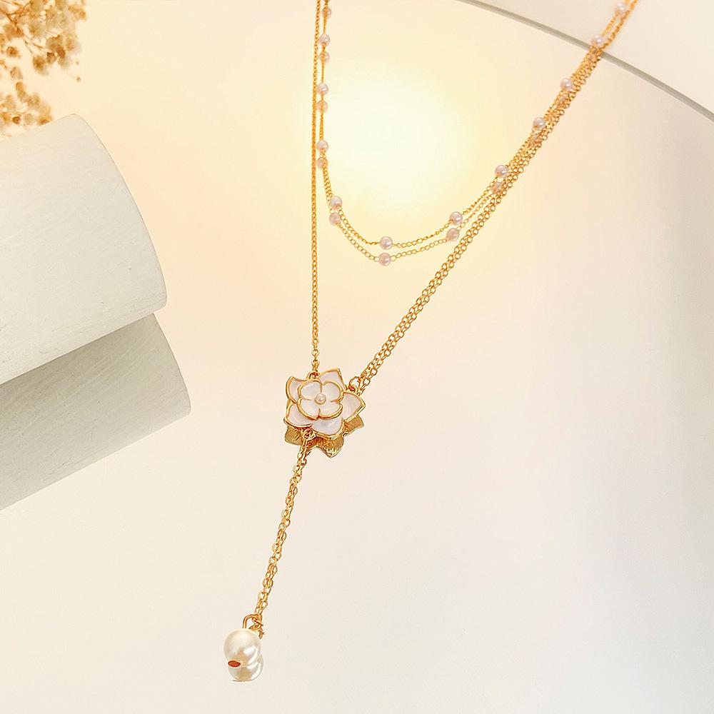 Ins double layered camellia necklace female fashion light luxury niche design pearl pendant sweater chain tide