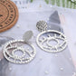 Exaggerated personality, hollow outline, eye earrings, earrings, female non-mainstream street photography, fun and exaggerated earrings