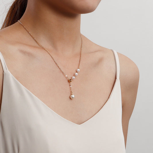 Jewelry simple and versatile imitation pearl pendant clavicle chain necklace female niche design sense light luxury ins