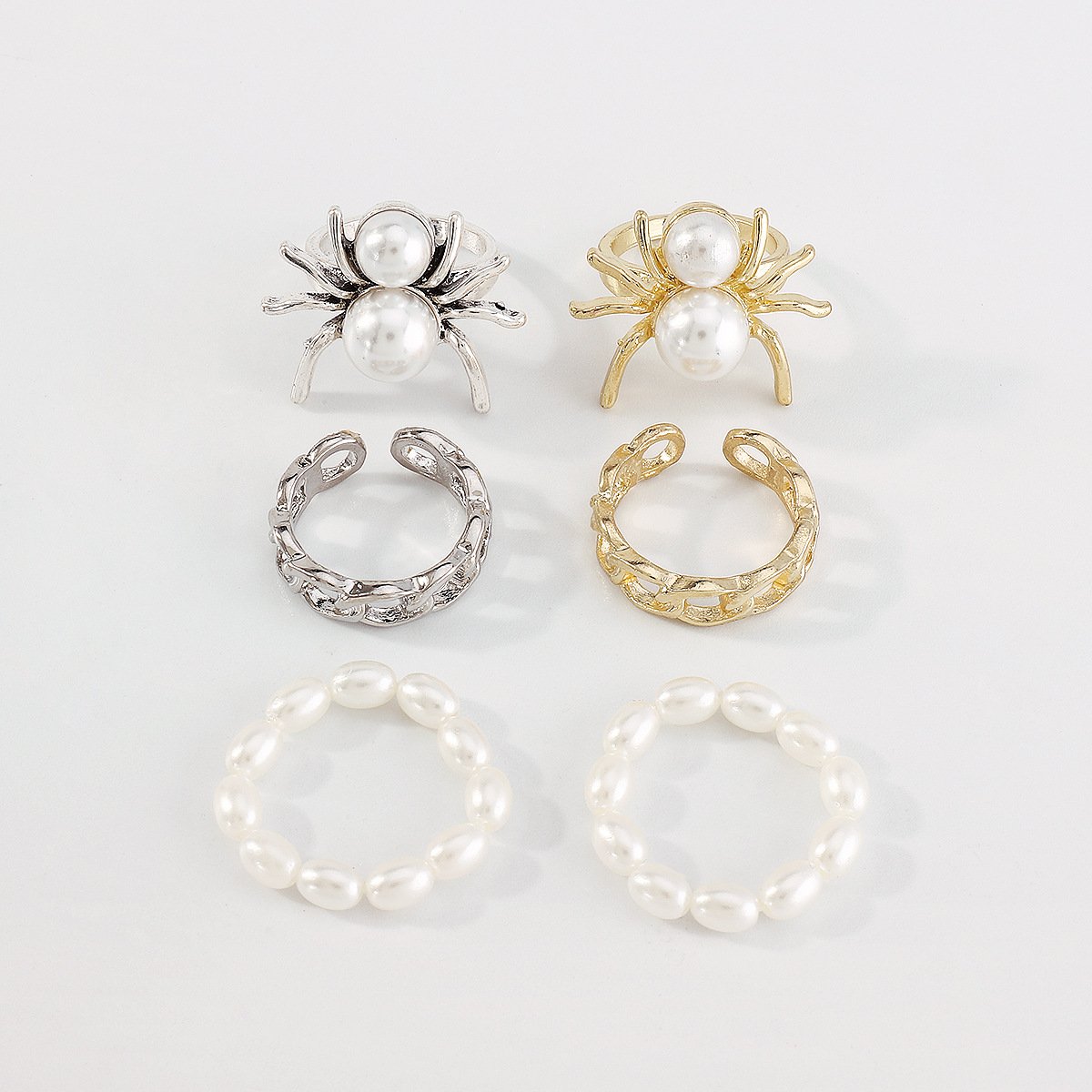 R763 Sweet Hand Jewelry Female Imitation Pearl Alloy Creative Chain Spider Ring Exaggerated Cold Ring
