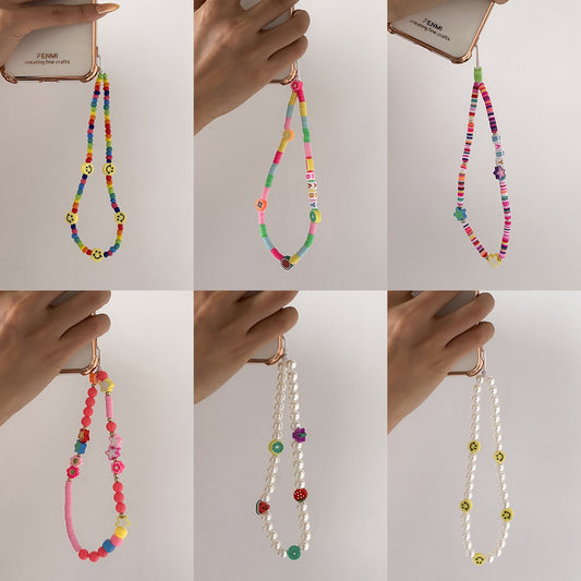 Creative summer multi-letter macaron color mobile phone chain holiday smiling face butterfly flower accessories female