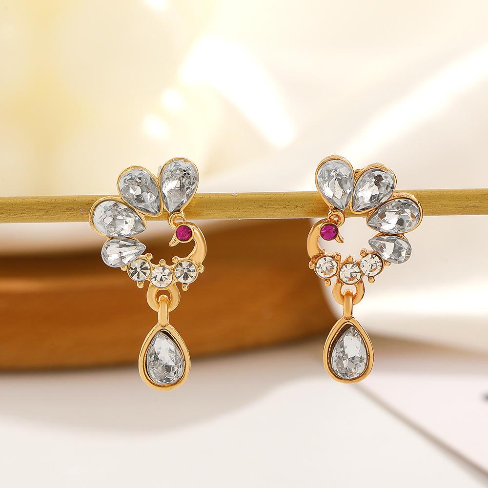 New Chinese style peacock earrings female retro fashion light luxury inlaid zircon phoenix earrings stud earrings national tide earrings