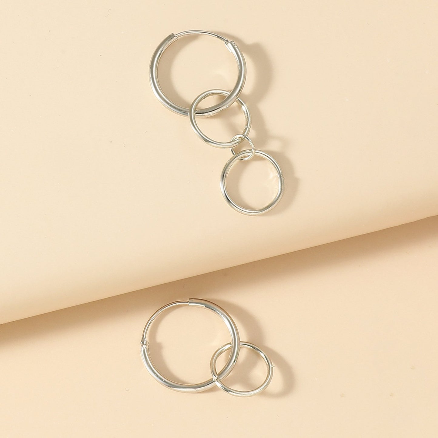 Wang Yibo's same style simple hoop earrings kid stainless steel circle earrings punk asymmetrical ear clips for men and women