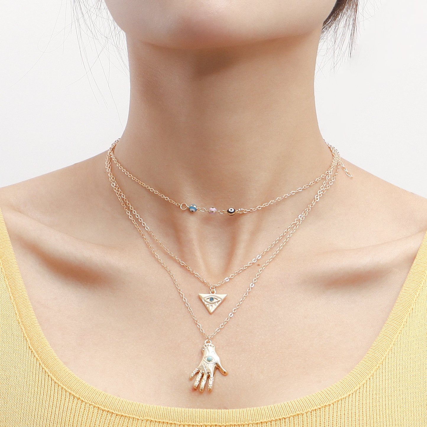 Accessories retro multi-layer devil's eye hand model necklace female jewelry niche high-end necklace light luxury