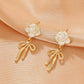 ins camellia bow earrings fashion light luxury niche design pearl tassel earrings temperament earrings