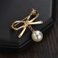 Temperament simple pearl bow brooch women's clothes fixed anti-light buckle pin corsage clothing accessories