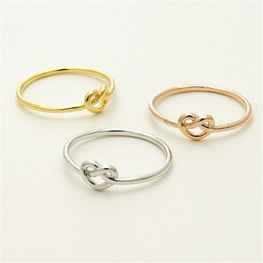 Explosive style knotted peach heart love ring female alloy electroplating heart to heart sweet love ring