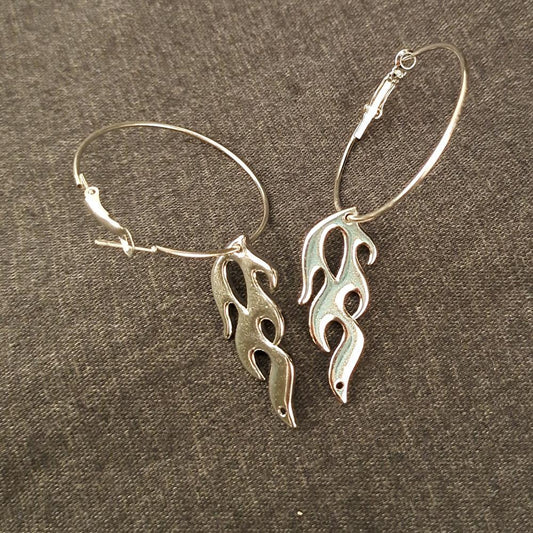Fashion atmosphere ladies flame earrings alloy white K