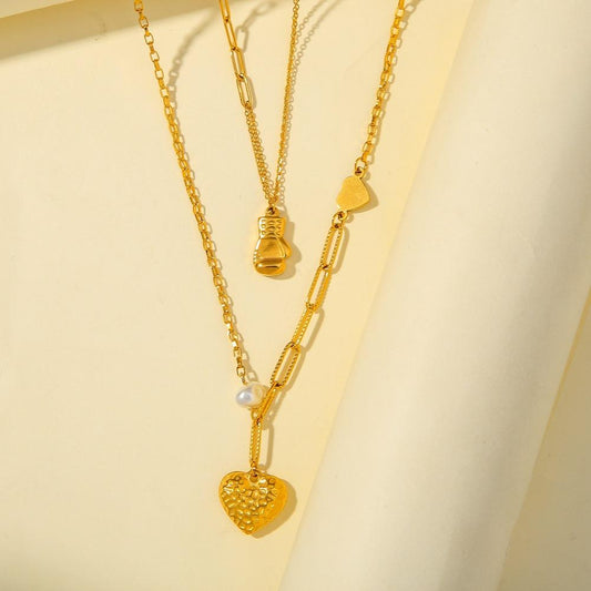 Fashion personality simple stainless steel double-layer boxing gloves knock pattern heart necklace peach heart pendant jewelry female