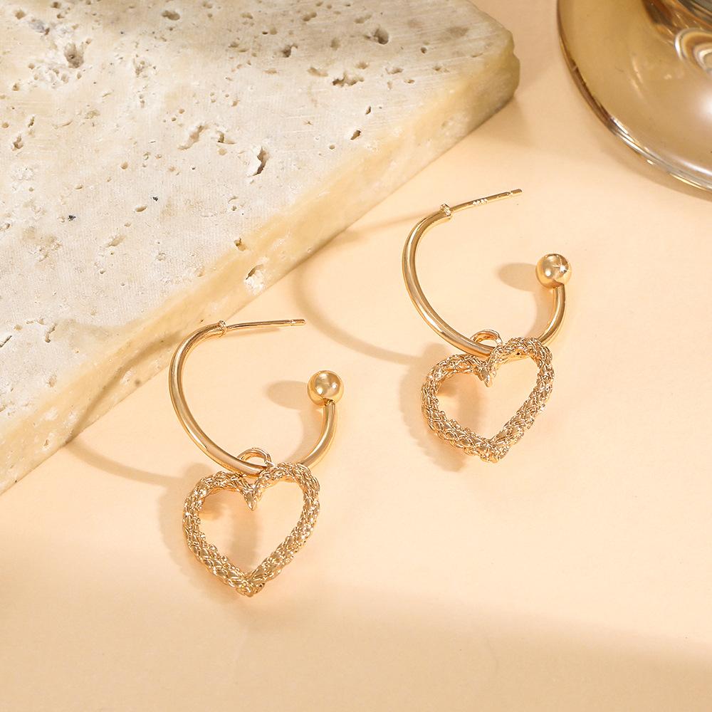 Hollow love earrings women's retro metal geometric heart-shaped earrings earhook ins net red earrings fashion