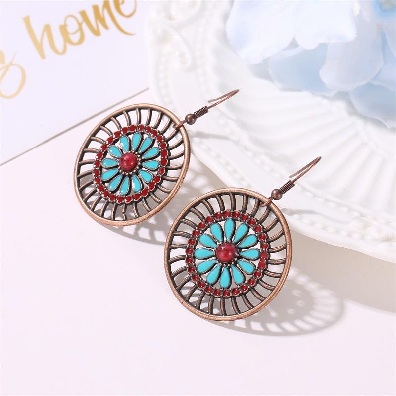 Ethnic personality earrings creative round hollow earrings female bohemian fashion retro flower earrings