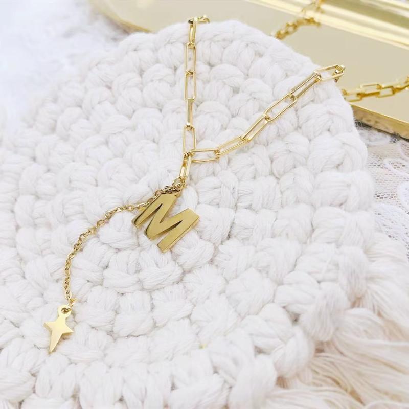 Titanium steel English letter M necklace female ins cold tassel five-pointed star collarbone chain all-match forest system net red necklace