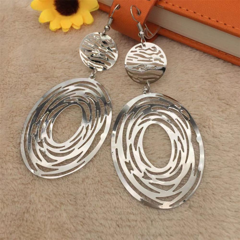 High cold night retro exaggerated earrings oval random cut hollow earrings Indian earrings