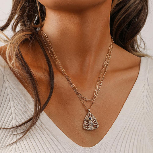 Ins personalized trend design high-end clavicle chain double-layer triangular hollow eyes moon dripping oil necklace female