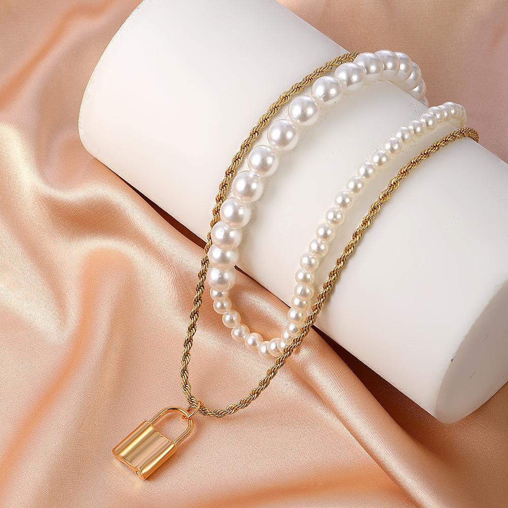 Retro multi-layer baroque pearl necklace female fashion temperament lock head stacked sweater chain personality collarbone chain