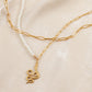 Fashion and simple temperament stainless steel gold double-layer pearl snake pendant necklace collarbone chain all-match